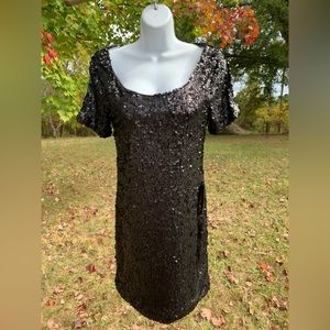 Brand new Short sleeve black sequin dress by Profile.